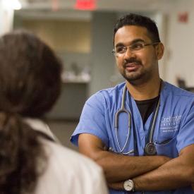 Group of people listening to a healthcare professional