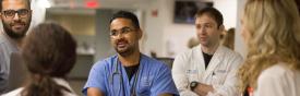 Group of people listening to a healthcare professional