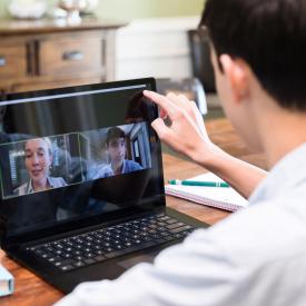 student and remote learning on laptop