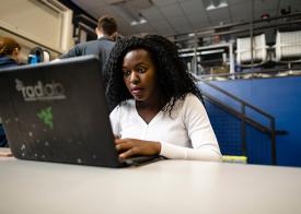 Woman learning at laptop computer 